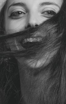 Free Stock Photo of Happy Brunette Model - Monochrome Portrait