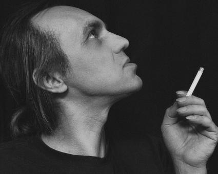 Free Stock Photo of Man Smoking a Cigarette - Monochrome