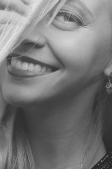 Free Stock Photo of Smiling Woman Portrait - Monochrome
