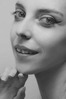 Free Stock Photo of Smiling Model Portrait - Monochrome
