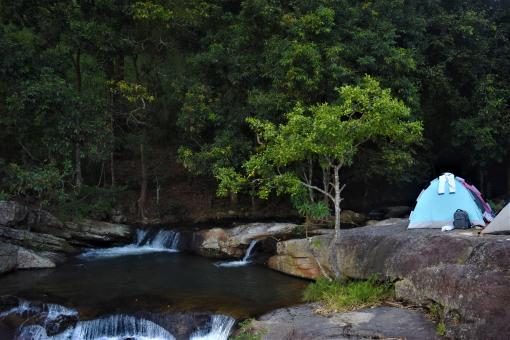 Free Stock Photo of Blue Tent by a Tropical Waterfall