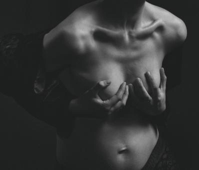 Free Stock Photo of Monochrome Model Holding Breasts