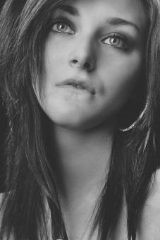 Free Stock Photo of Brunette Beauty Biting Lips - Monochrome