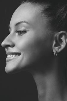 Free Stock Photo of Smiling Girl Profile - Monochrome