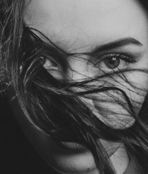 Free Stock Photo of Woman Portrait - Hair Over Face - Monochrome