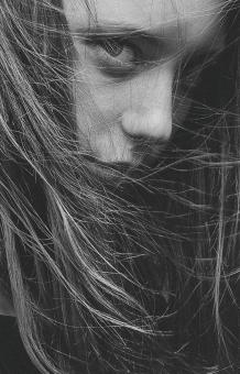 Free Stock Photo of Hidden in Hair - Girl Monochrome Portait