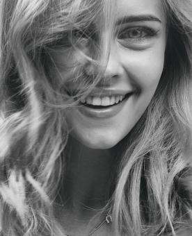 Free Stock Photo of Smiling Blond Girl - Monochrome Portrait