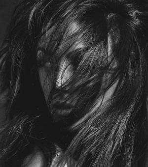 Free Stock Photo of Monochrome Portrait - Dark Haired Woman