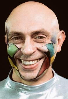 Free Stock Photo of Smiling Bald Man with Colored Face
