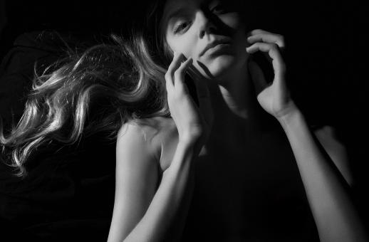 Free Stock Photo of Low Key Woman Portrait - Black and White