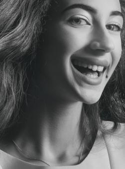 Free Stock Photo of Happy Young Woman - Monochrome Portrait