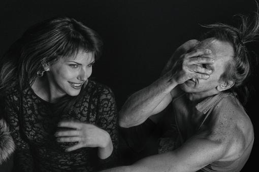 Free Stock Photo of Couple - Man Holding Face - Woman Surprised - Monochrome