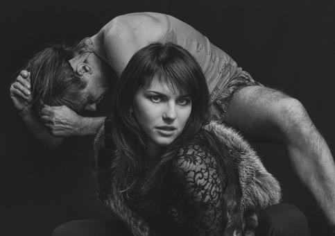 Free Stock Photo of Man Hiding Behind Woman - Monochrome
