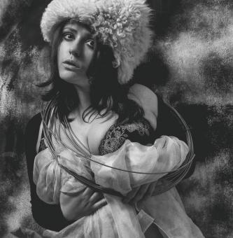 Free Stock Photo of Girl in Dress with Fur Hat - Monochrome Portrait