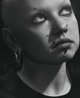Free Stock Photo of Girl with Piercings - Monochrome Portrait
