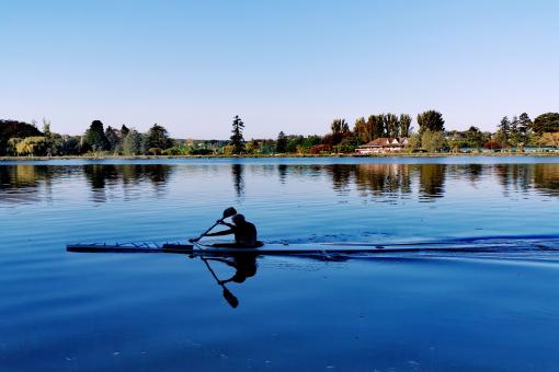 Free Stock Photo of Kayaker Rowing on Water