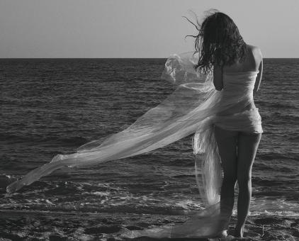 Free Stock Photo of Girl by the Sea - Monochrome