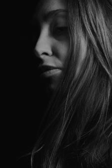 Free Stock Photo of LowKey Black and White Female Portrait