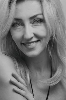 Free Stock Photo of Blond Woman Portrait - Smiling - Monochrome