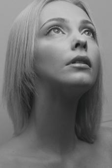 Free Stock Photo of Portrait of Blond Girl Looking Up - Monochrome