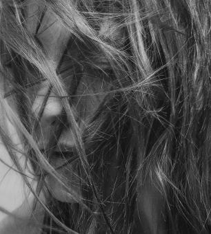 Free Stock Photo of Girl Model with Messy Hair - Monochrome