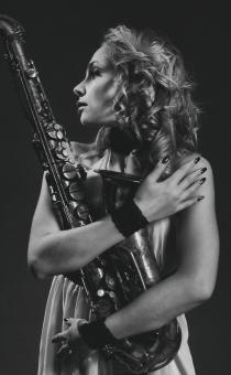 Free Stock Photo of Female Saxophone Player