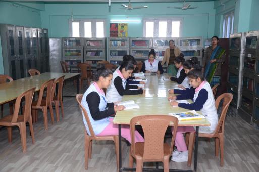 Free Stock Photo of girls studying in library