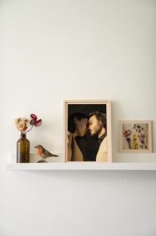 Free Stock Photo of Framed photos on a shelf