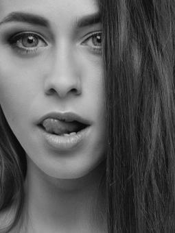 Free Stock Photo of Woman licking lips
