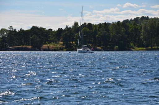 Free Stock Photo of A boat is sailing near Langoya