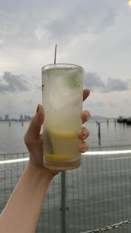 Free Stock Photo of Collagen Lemonade drink with beautiful seaview