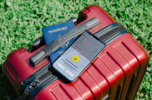 Free Stock Photo of A photo displaying a U.S. passport and a smartphone 