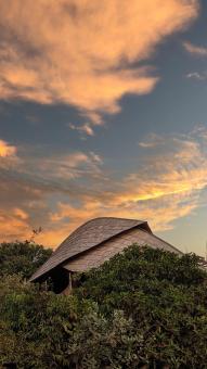 Free Stock Photo of Sunset over building