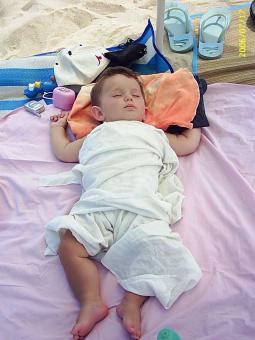 Free Stock Photo of Sleeping on the sand