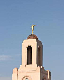 A tower with a golden statue - Free Stock Photo