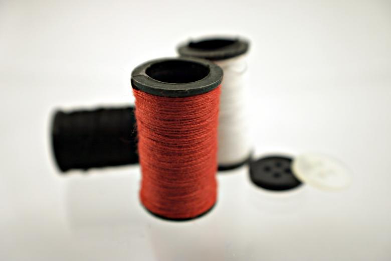 Free stock image of Red thread and buttons created by Bjorgvin