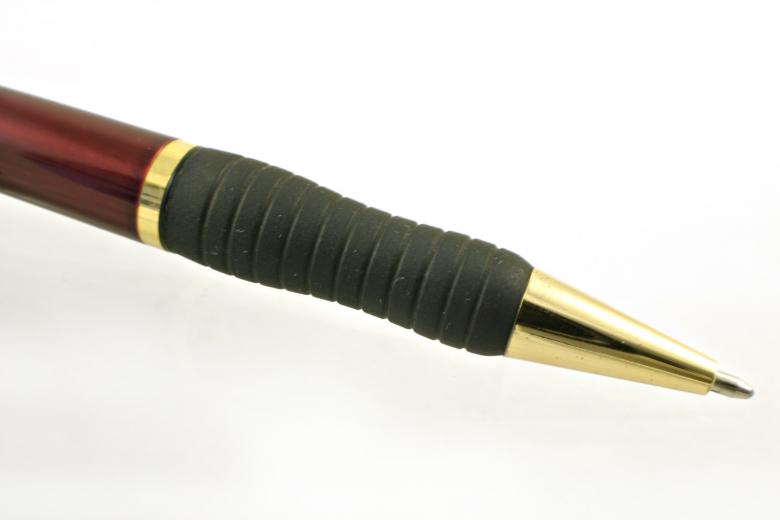 Free stock image of Red and golden pen closeup created by Bjorgvin