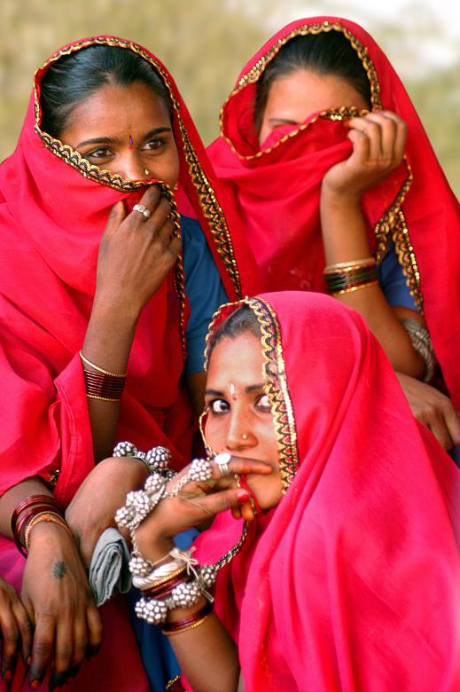 Free stock image of girls in red created by Prakash Hatvalne