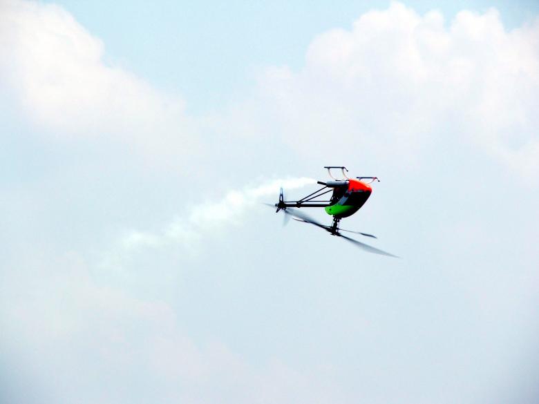 Free stock image of rc helicopter in flight created by Heather Elaine Kitchen
