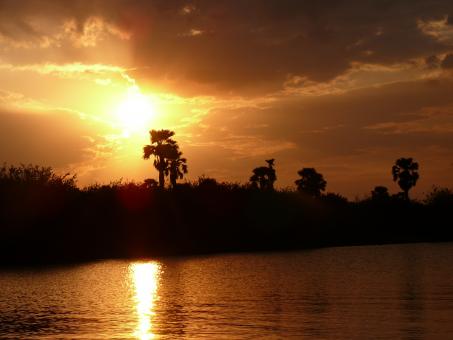 African sunset by the river - Free Stock Photo