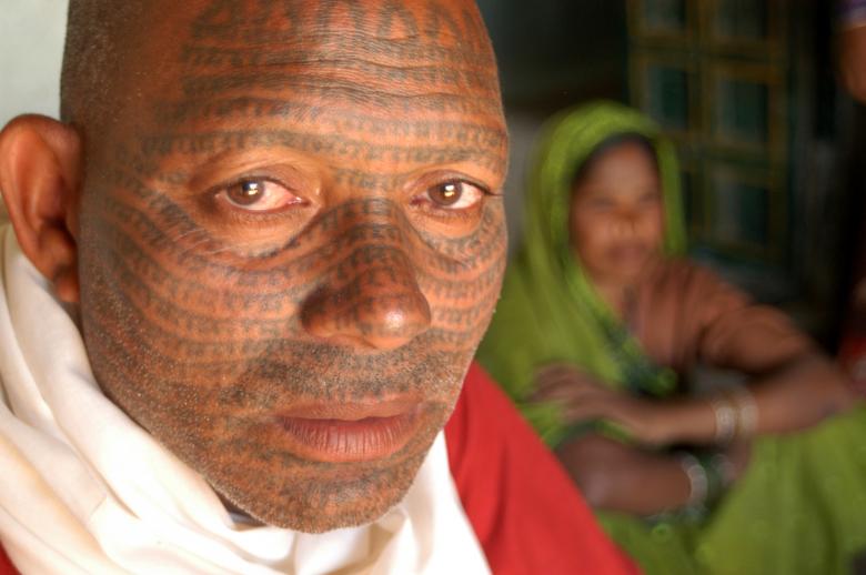 Free stock image of A man with tattoos created by Prakash Hatvalne