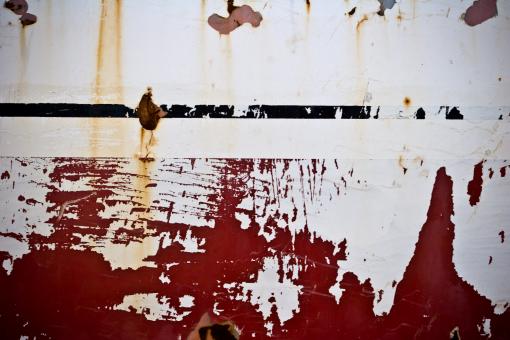Free Stock Photo of Scratched red wall surface