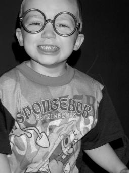 Free Stock Photo of Child Close Up with Silly Glasses B&