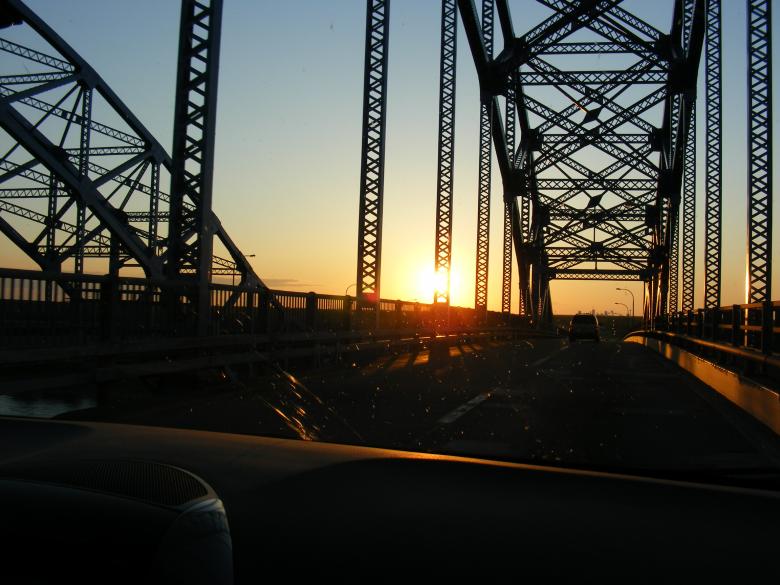 Free stock image of Sun set through a bridge created by Nirodha Abeywardana