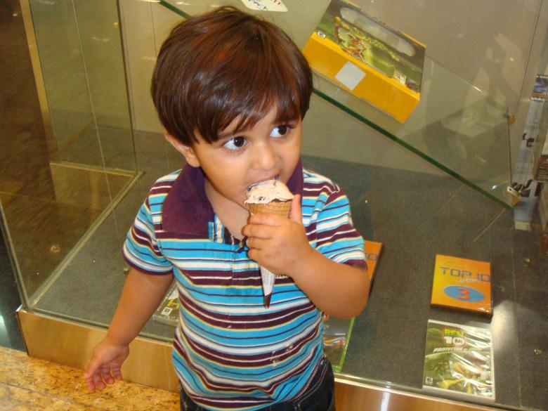 Free stock image of Child eating ice cream created by Ali Haider