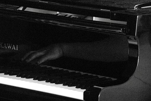 Piano with hand reflection - Free Stock Photo