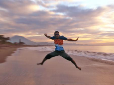 Jump to fly along the coast - Free Stock Photo