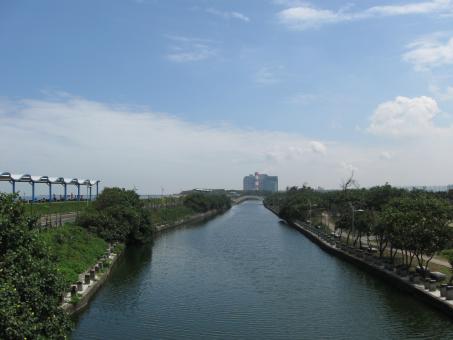 River Leading to an Office Building