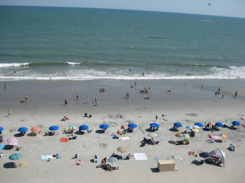 Free stock image of Overlooking the crowded beach created by John Boker