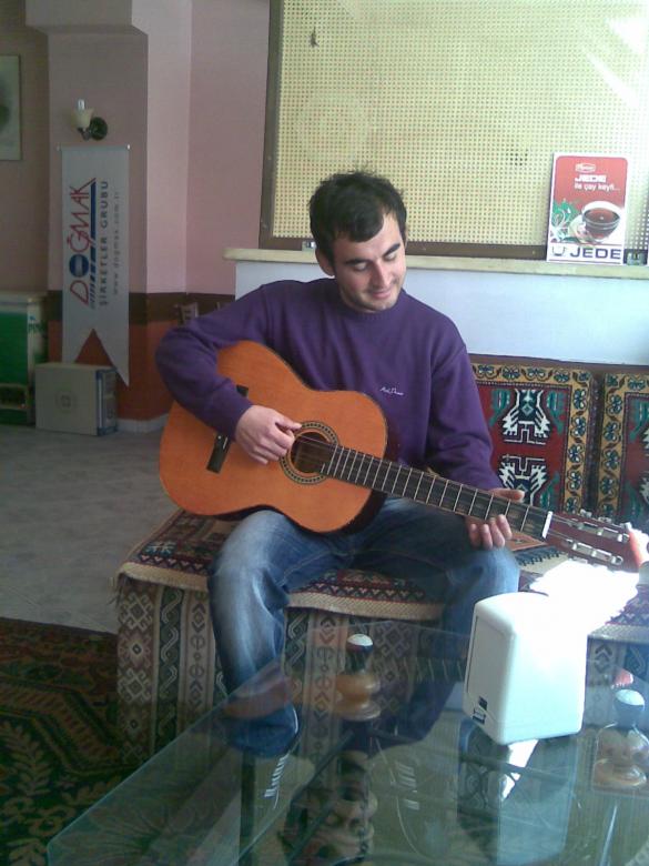 Free stock image of Kerim playing the guitar created by kerim mutlu